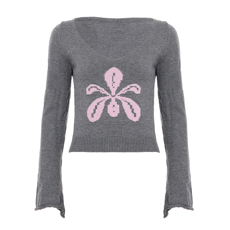 Women's fine knit sweater with wide boat neckline, flared sleeves, and intarsia flower motif Mune Fashion
