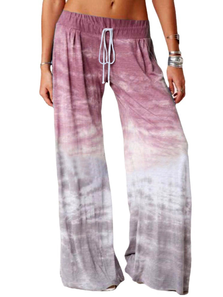 Ladies wide batik pants with drawstring, pleats, and side pockets Mune Fashion