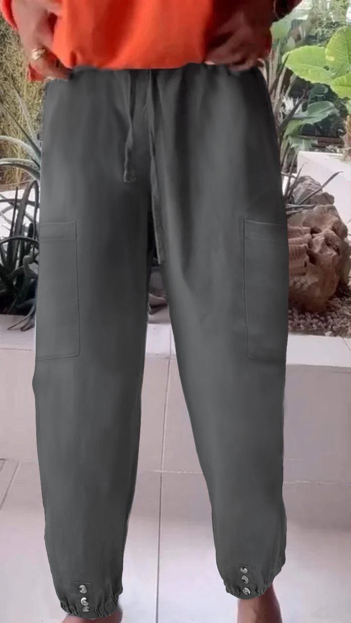 Ladies cargo jogging pants with drawstring, patch pockets and button cuffs Mune Fashion
