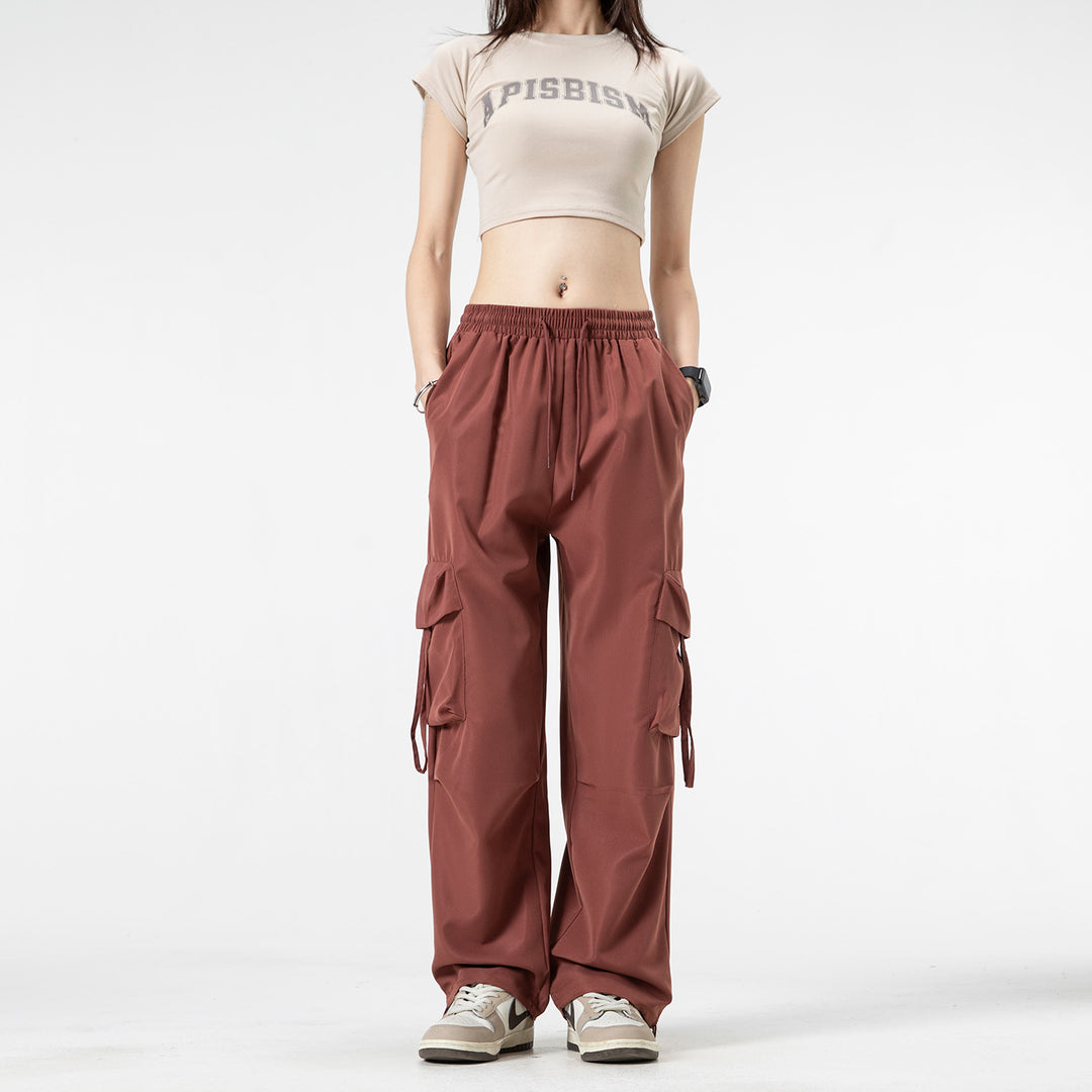 Unisex Wide Cargo Pants in Baggy Cut with Drawstring Waistband, Multiple Flaps, and Adjustable Leg Closures Drune