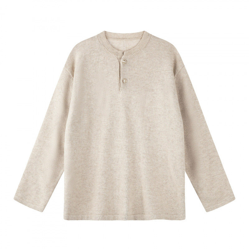 Unisex Oversize knit sweater with Henley button placket, straight hem and light texture Mune Fashion