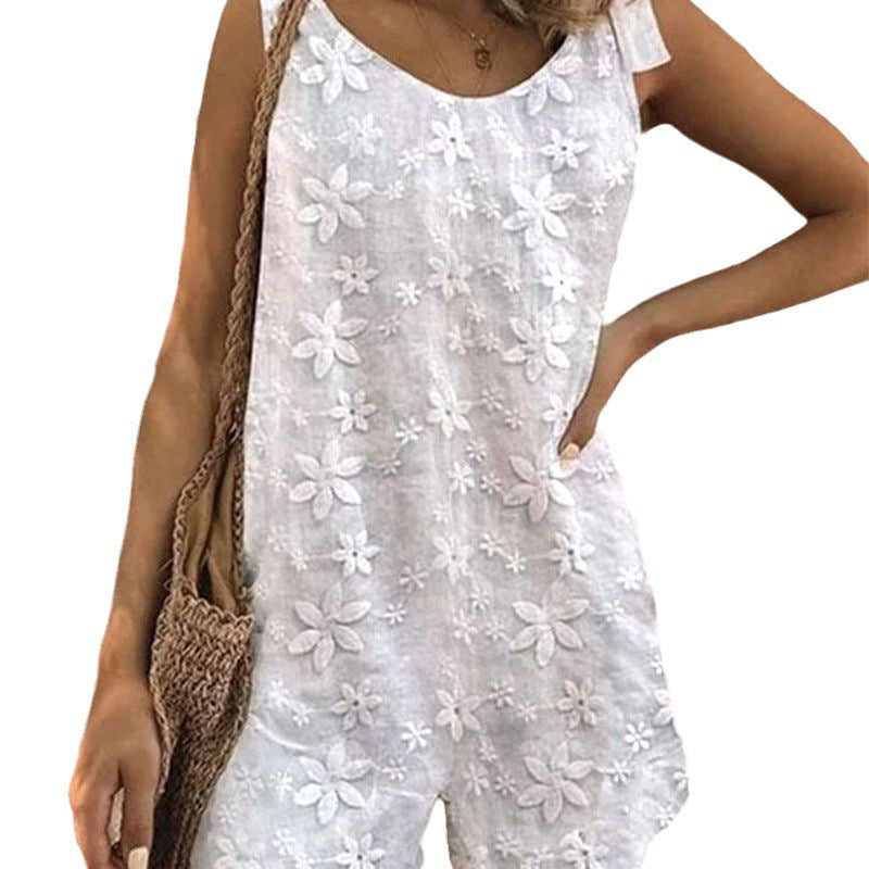 Women's lighter short overall with floral three-dimensional embroidery, adjustable tie straps and loose A-line silhouette Mune Fashion