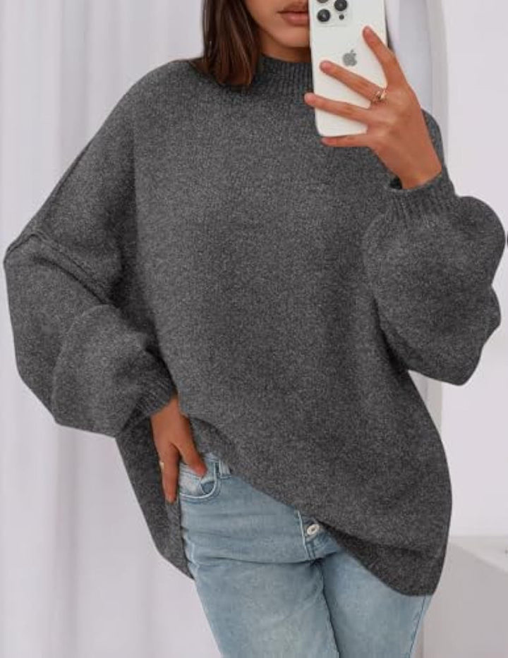 Ladies oversized knitted pullover with stand-up collar and balloon sleeves Drune