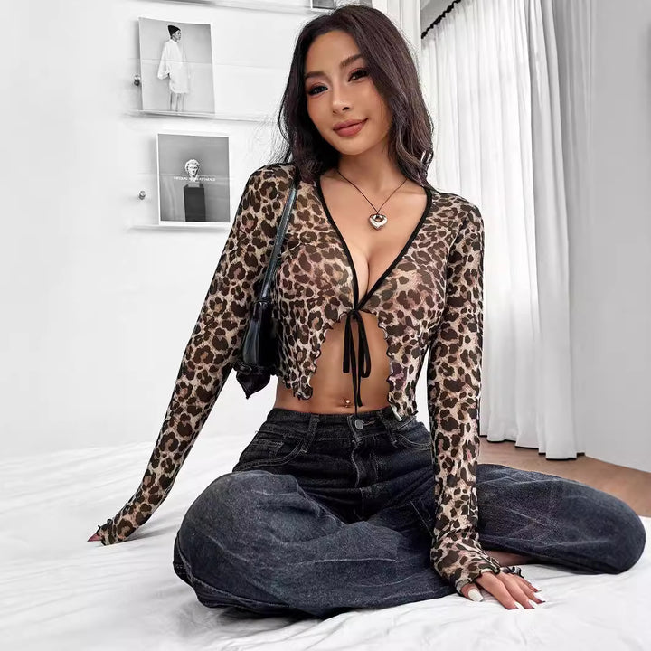 Women’s fitted mesh crop top with leopard print, deep V-neck, tie strap, and wavy hem Mune Fashion
