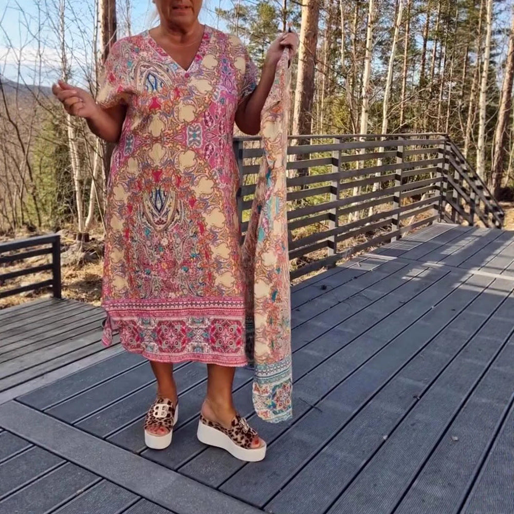 Women's airy V-neck dress in paisley print with side pockets and matching pareo Mune Fashion