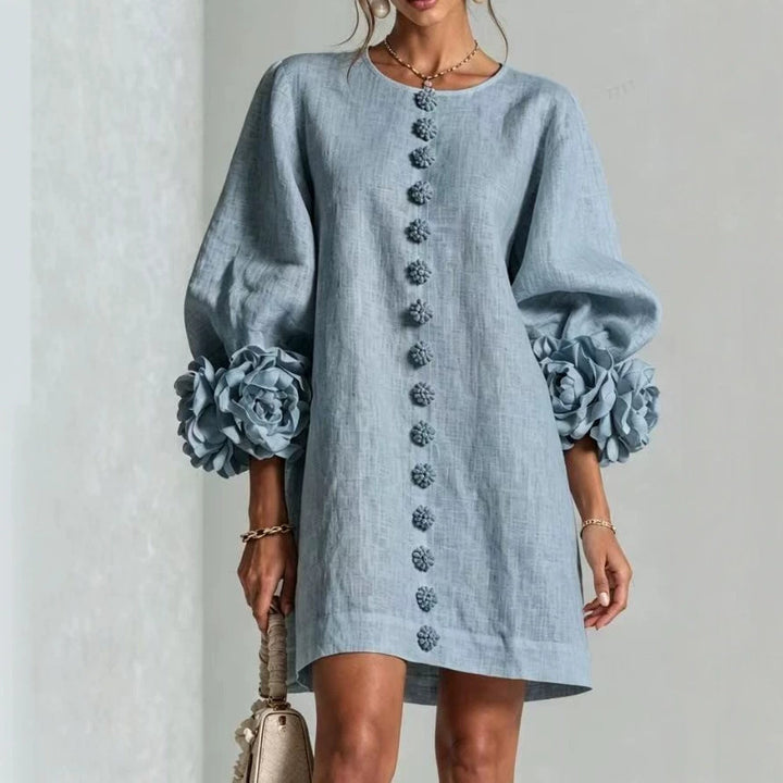 Women’s midi dress with voluminous puff sleeves, 3D flower button placket and linen texture Mune Fashion
