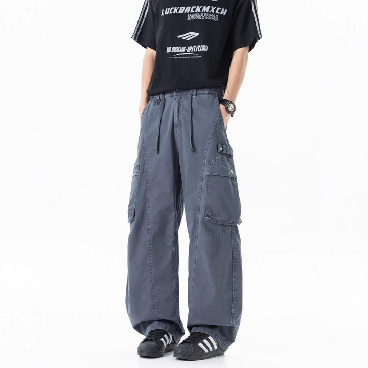 Men's military-inspired cargo pants with elastic tunnel drawstring waistband, flap and zipper pockets Mune Fashion
