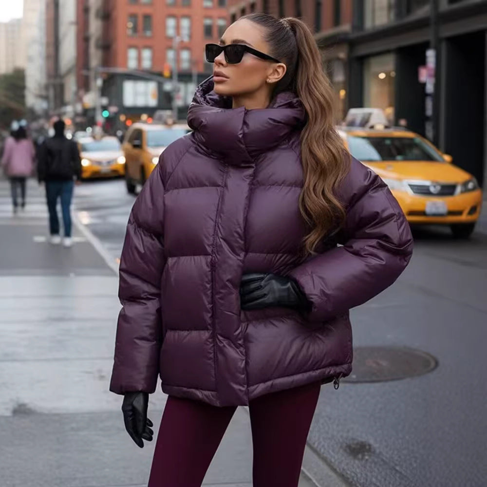 Ladies short padded oversized quilted jacket with high standing collar and hood Mune Fashion