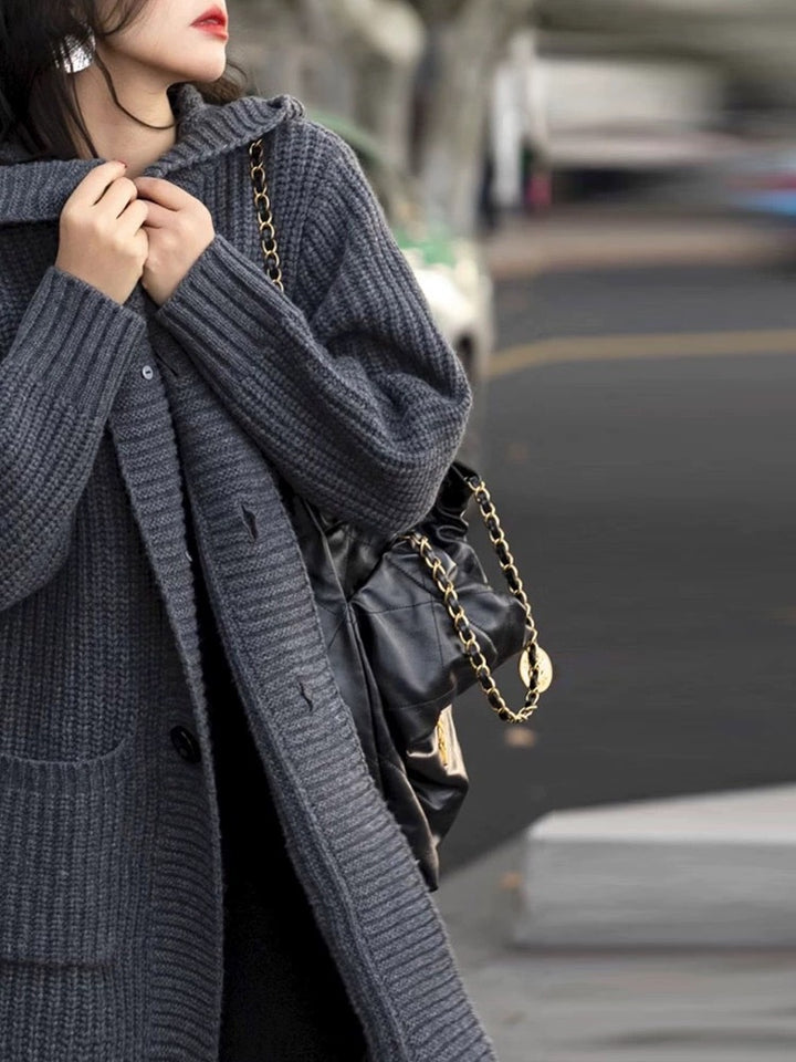 Women's Long Hooded Cardigan made of chunky rib knit with pocket inserts Mune Fashion