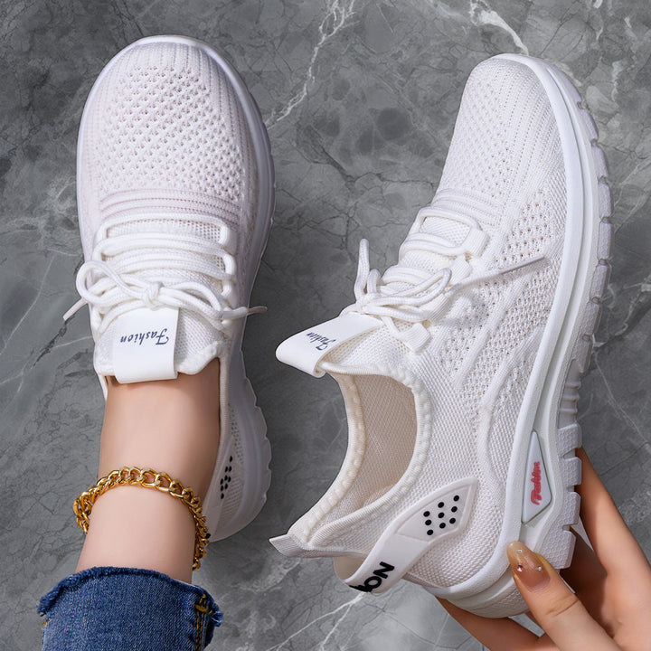 Women's sock-like knit-fit sneakers with elastic lacing, perforated heel reinforcement, and cushioned platform sole Mune Fashion
