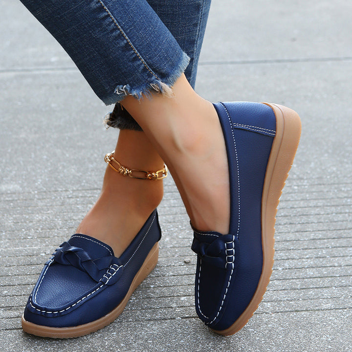 Ladies braided comfort moccasin with contrast stitching, padded memory insole, and flexible rubber profile Mune Fashion
