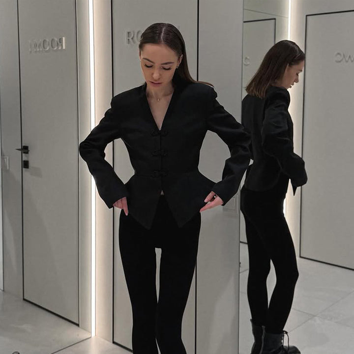 Women's peplum blazer with mandarin-like neckline and decorative knot fastenings Mune Fashion