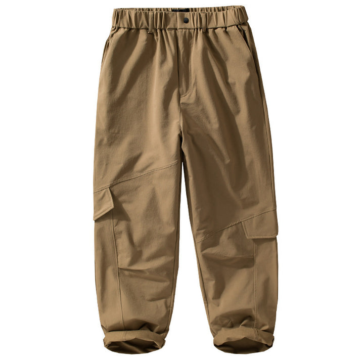 Men's cargo pants in utility look with relaxed fit, multiple thigh pockets and elastic waistband Mune Fashion