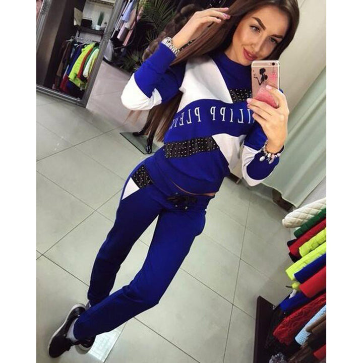Women's sporty tracksuit set with studded detailing and color block design Mune Fashion