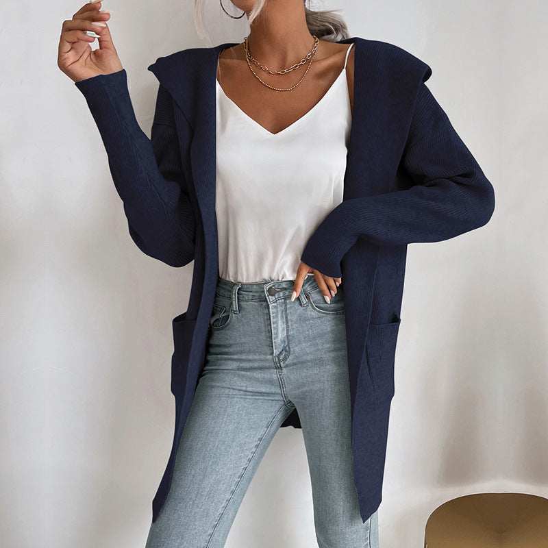 Women's longer ribbed cocoon cardigan made of lightweight fine knit with patch pockets Mune Fashion