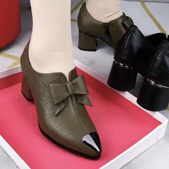 Women's elegant pumps with pointed metal cap, decorative bow, side zipper, and mid-high block heel Mune Fashion