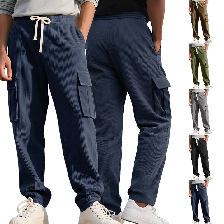 Men's casual utility cargo joggers with vertical ribbed structure, drawstring waistband, and large flap pockets Mune Fashion