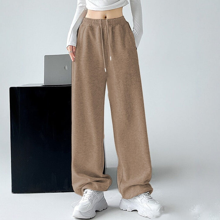 Ladies Nan extra wide palazzo sweatpants with high comfort waistband, side pockets, slit at hem and drawstring Mune Fashion