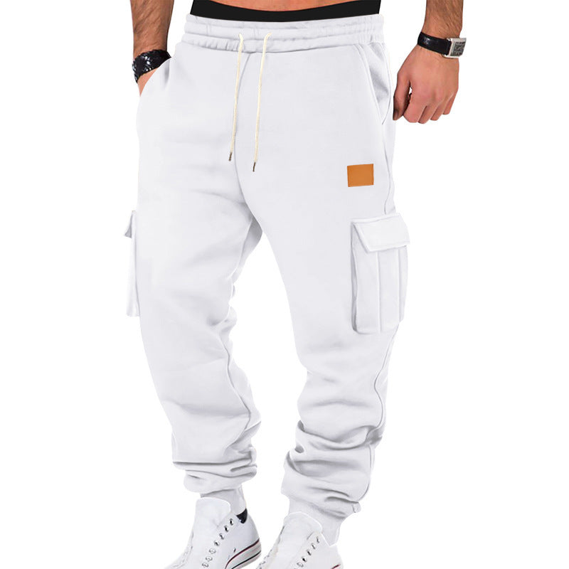 Men's tapered utility sweatpants with large flap pockets, elastic drawstring waistband, and ribbed leg cuffs Mune Fashion