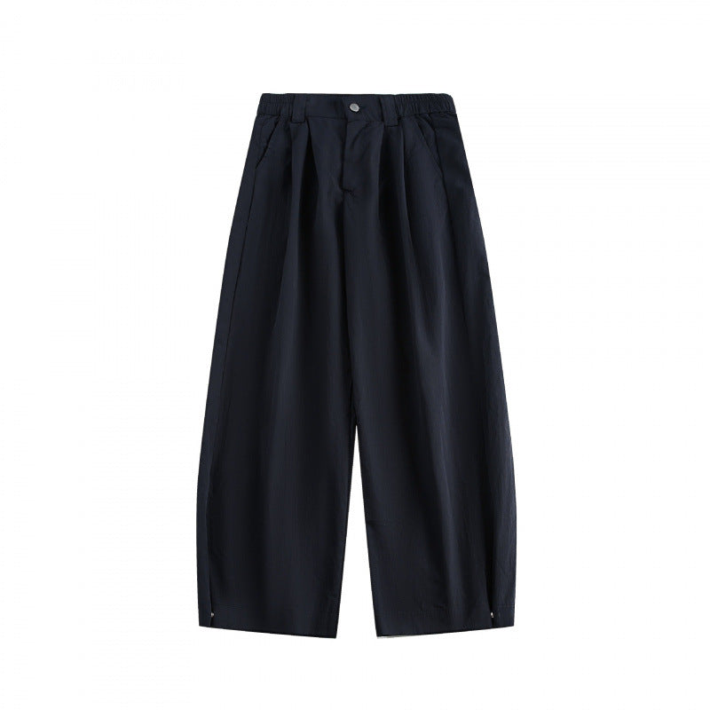 Women's wide high-waisted culotte pants with pleats, elastic waistband, and side pockets Mune Fashion