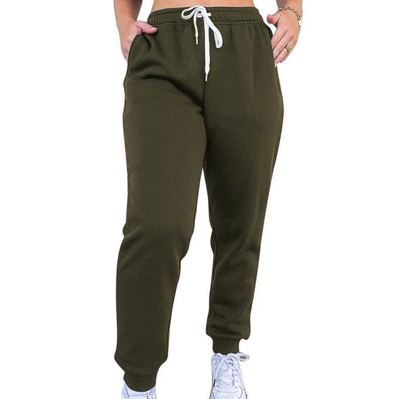 Women's tapered jogging pants at ankle height with elastic comfort waistband, adjustable drawstring, and deep side pockets Mune Fashion