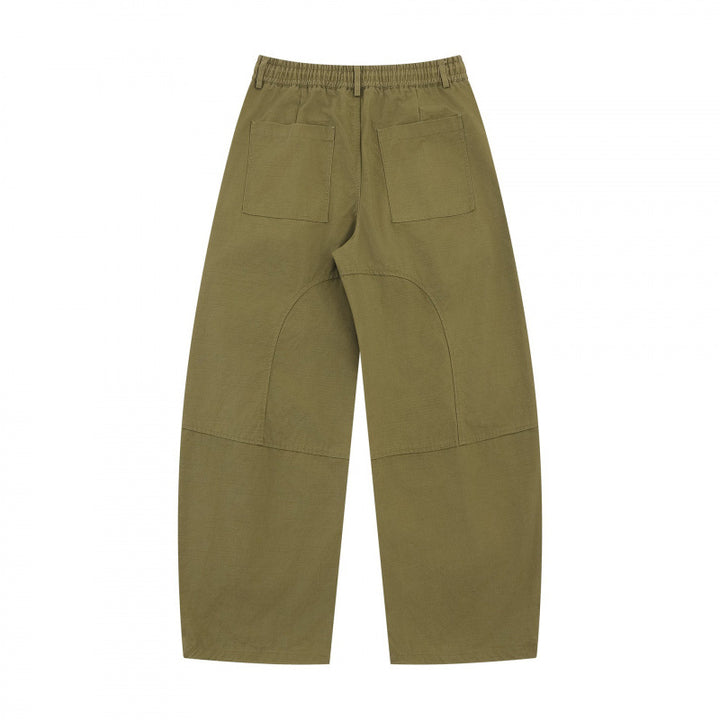 Unisex Wide Utility Cargo Pants made of cotton blend with drawstring waistband, large patch pockets, and balloon-shaped silhouette Mune Fashion