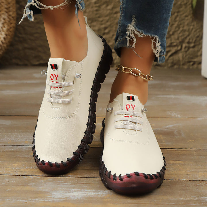 Women's Comfortable Leather-Look Slippers with Flexible Profile Sole and Moccasin Stitch