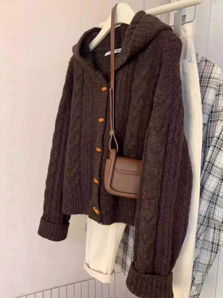Women's hooded cardigan with cable knit, wooden button placket, and boxy silhouette Mune Fashion