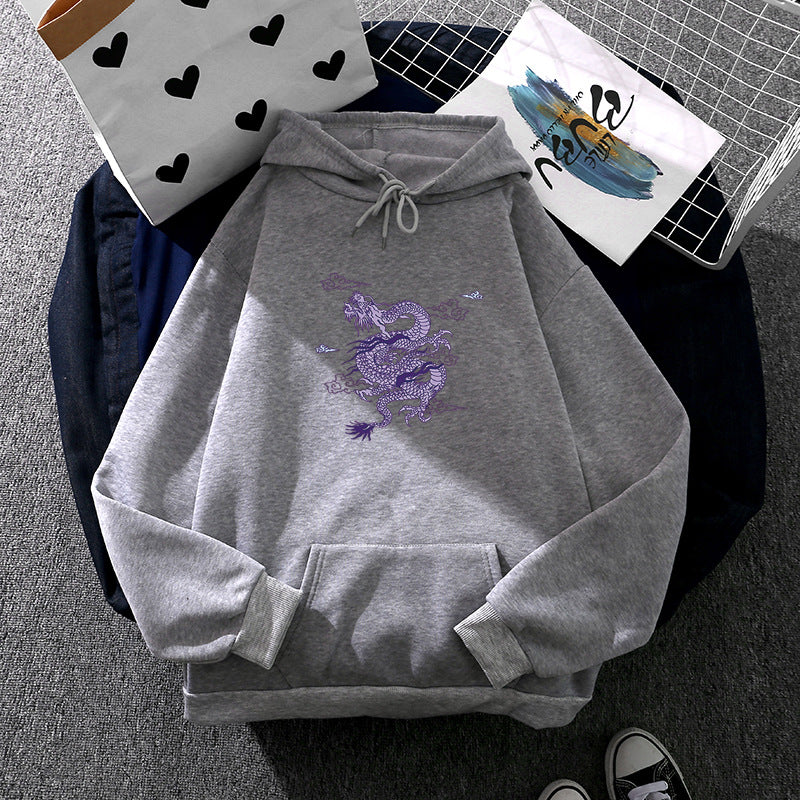 Unisex oversized hoodie with detailed dragon print, brushed fleece lining, and kangaroo pocket Mune Fashion