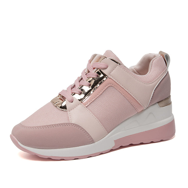 Women's wedge sneakers with perforated upper material, padded comfort collar and reflective metal details Mune Fashion