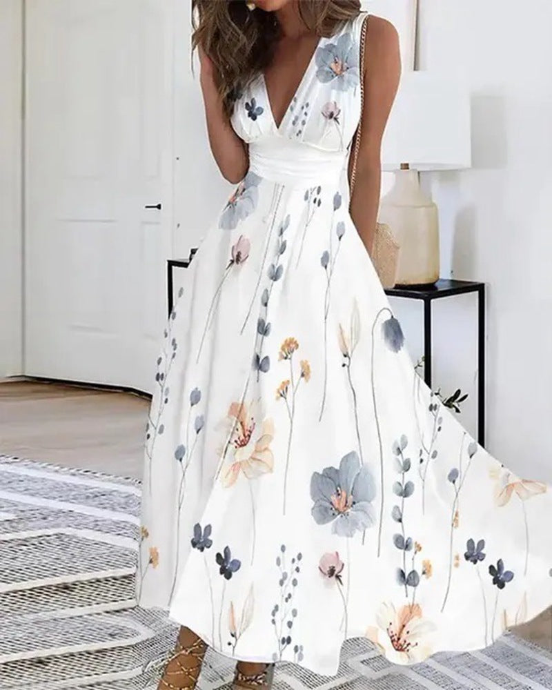 Women's flared midi dress with deep V-neck, empire waist and delicate floral print Mune Fashion
