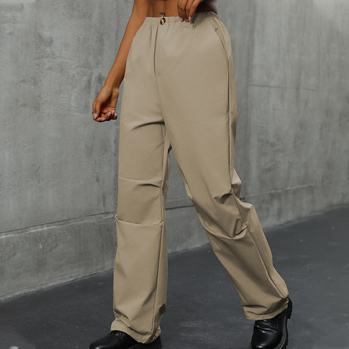 Women's loosely cut utility pants with high elastic waistband, drawstring hem & concealed button placket Mune Fashion
