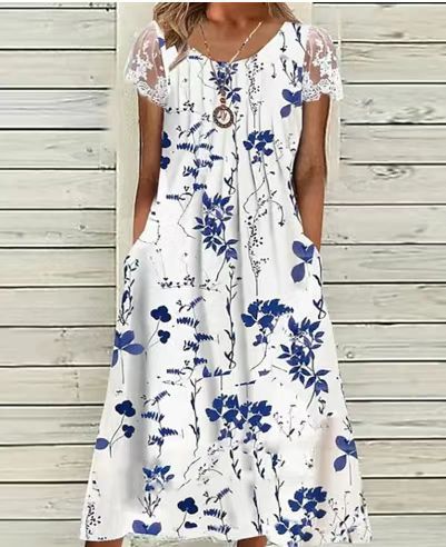 Ladies' airy A-line midi dress with lace sleeves, side pockets, and round neckline Mune Fashion
