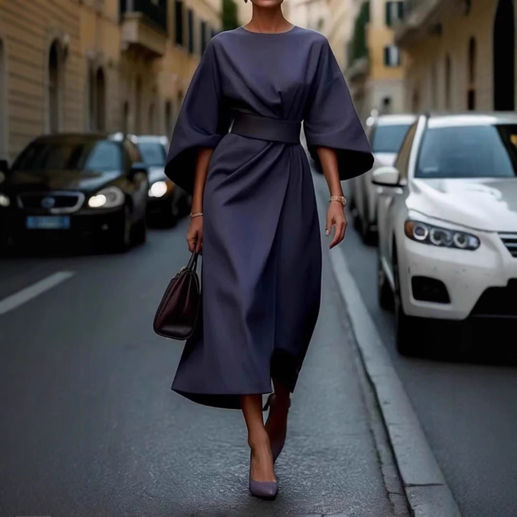 Women's minimalist evening dress with overlong wide sleeves and waist-sculpting pleat draping Mune Fashion