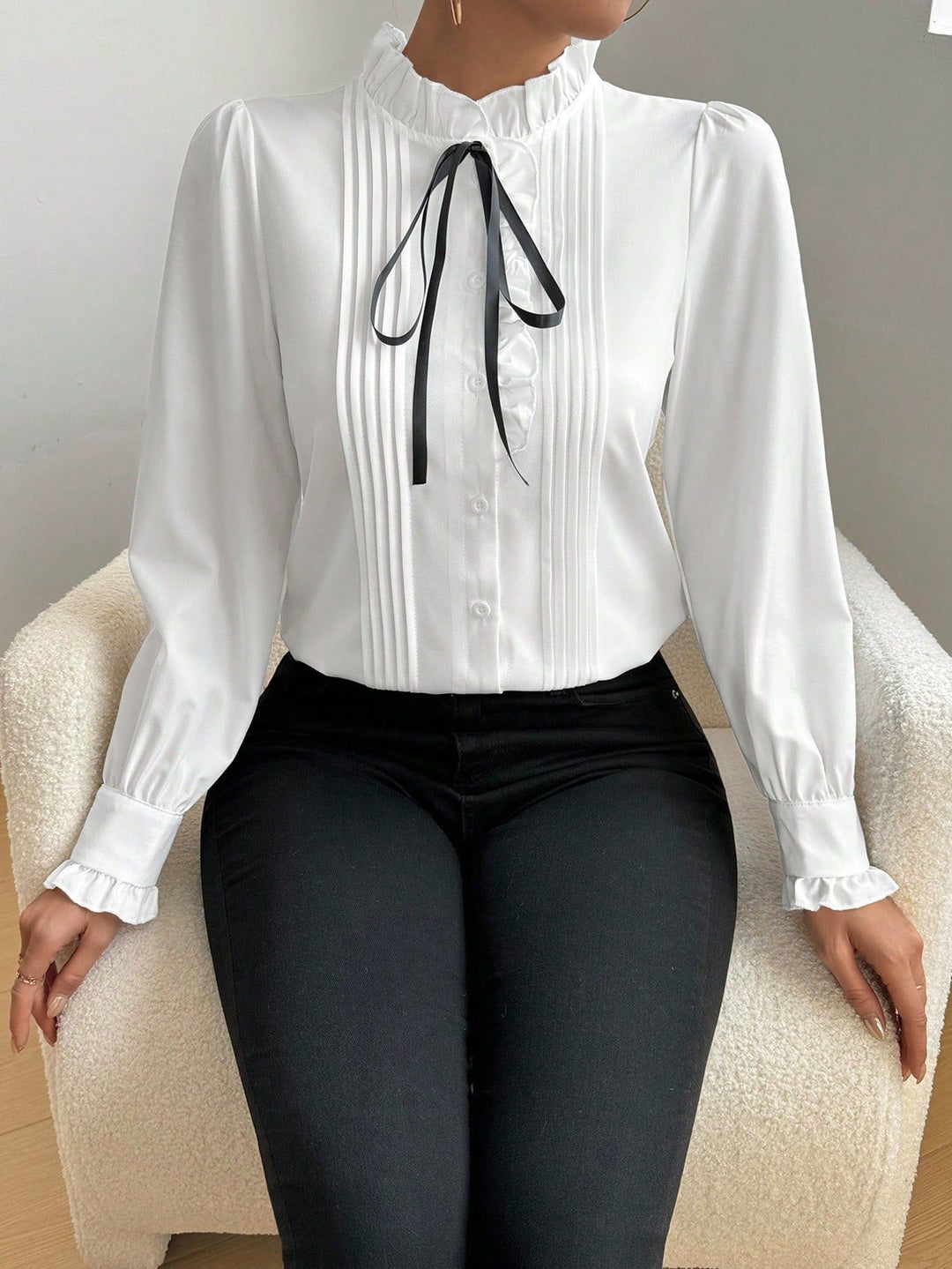 Women's ruffle blouse with stand-up collar, vertical pleats and ribbon tie Drune