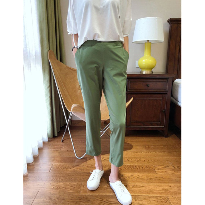 Women High-waisted ankle-length chino trousers with slim tapered silhouette and stretch waistband Mune Fashion