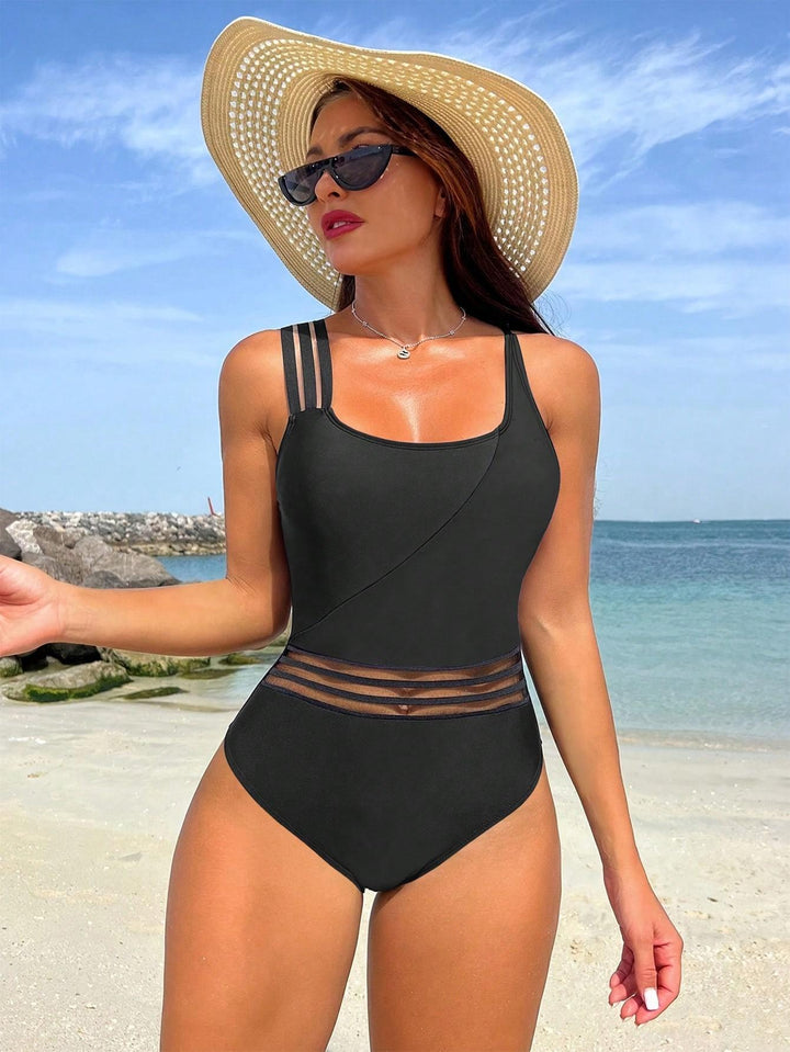 Ladies sporty one-piece swimsuit with innovative cut Mune Fashion