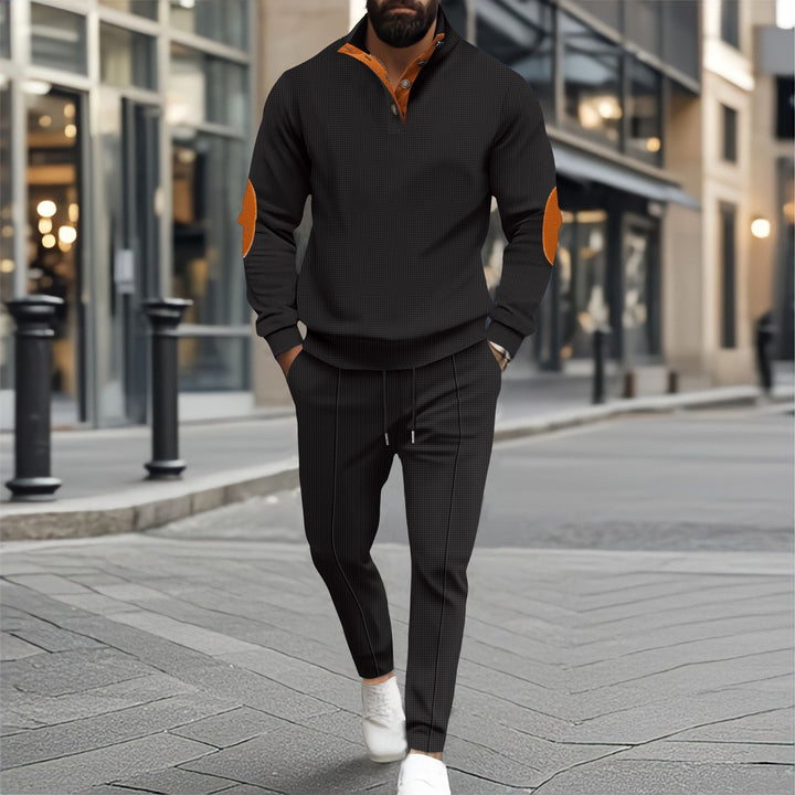 Men's fine-structured half-collar sweatshirt with button placket, decorative elbow patches, and casual hem finish Mune Fashion