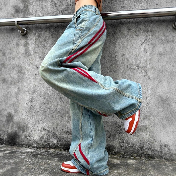 Women's low-rise extra-wide baggy jeans made of vintage denim with side tape stripes Mune Fashion