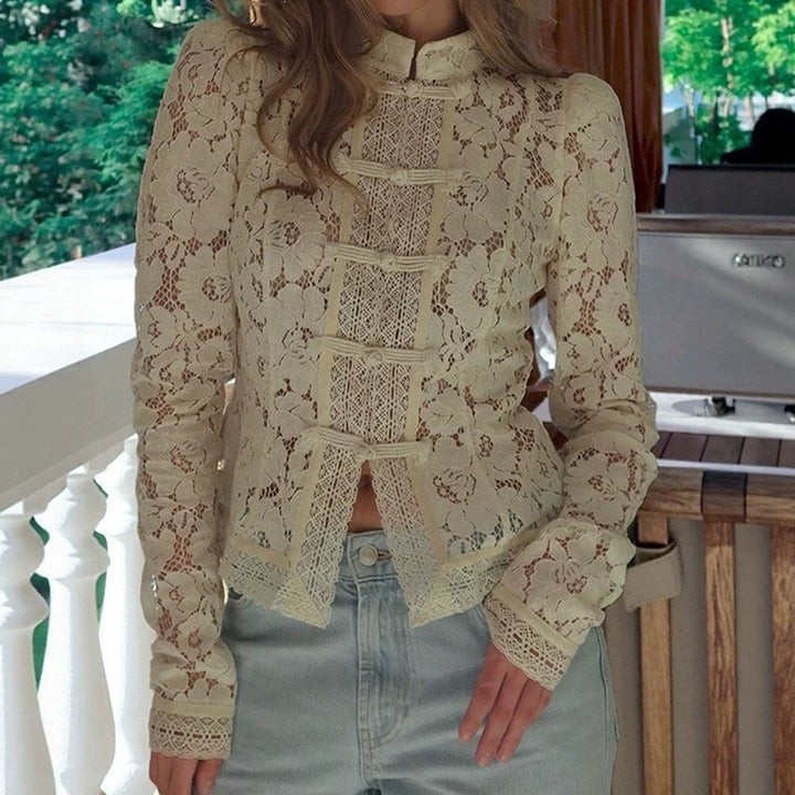 Women's figure-hugging lace blouse with stand collar, decorative knot closure, and crocheted hem Mune Fashion