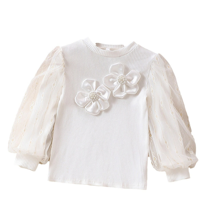 Girls fashionable blouse with transparent puff sleeves and floral accents Mune Fashion