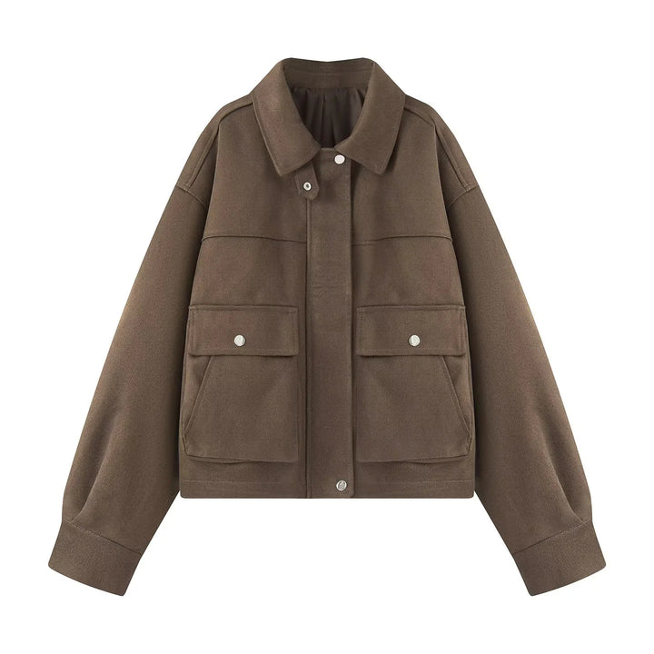 Women's boxy short utility jacket with large flap pockets, snap button placket, and drop shoulder Mune Fashion