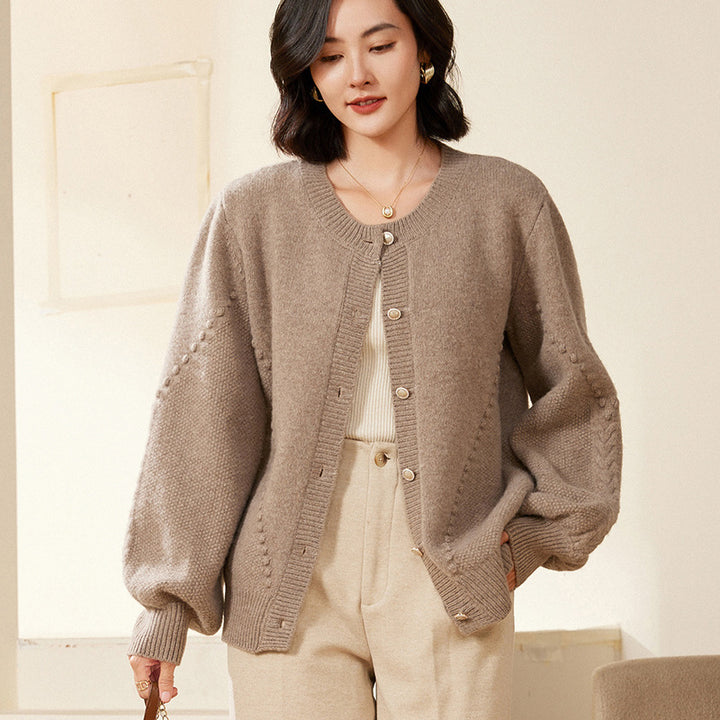 Women's knitted cardigan with textured pattern, balloon sleeves and pearly button placket Mune Fashion
