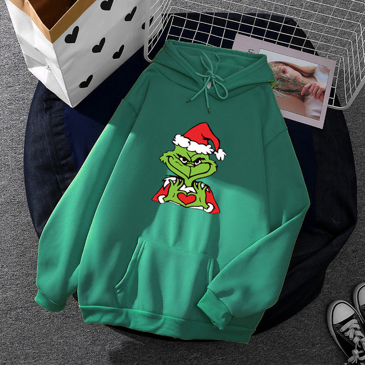 Unisex hoodie with soft fleece lining, kangaroo pocket and eye-catching Christmas comic print Mune Fashion