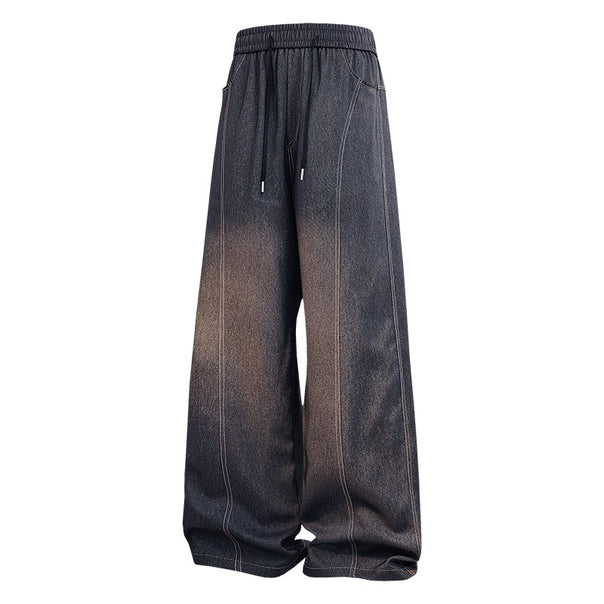 Women's Wide Denim Pants with Elastic Waistband, Drawstring and Vertical Decorative Seams Mune Fashion