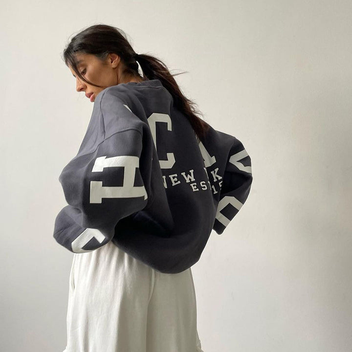 Damen Oversize-Sweatshirt mit College-Print und Raglanärmeln Mune Fashion