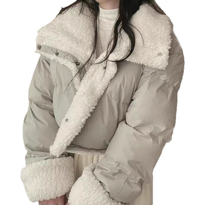 Women's short quilted puffer jacket with teddy collar, roll-up sleeves, and drawstring hem Mune Fashion