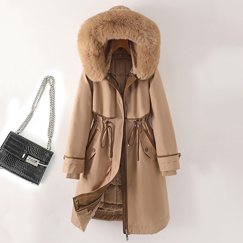 Women's long parka with faux fur hood, waist drawstring, and contrasting piping Mune Fashion