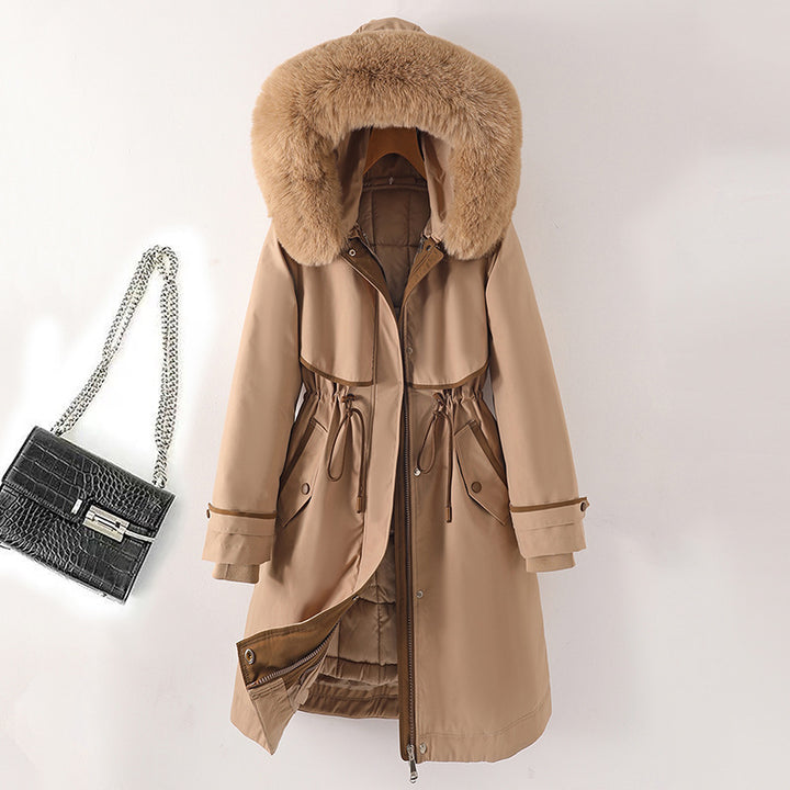 Women's long parka with faux fur hood, waist drawstring, and contrasting piping Mune Fashion