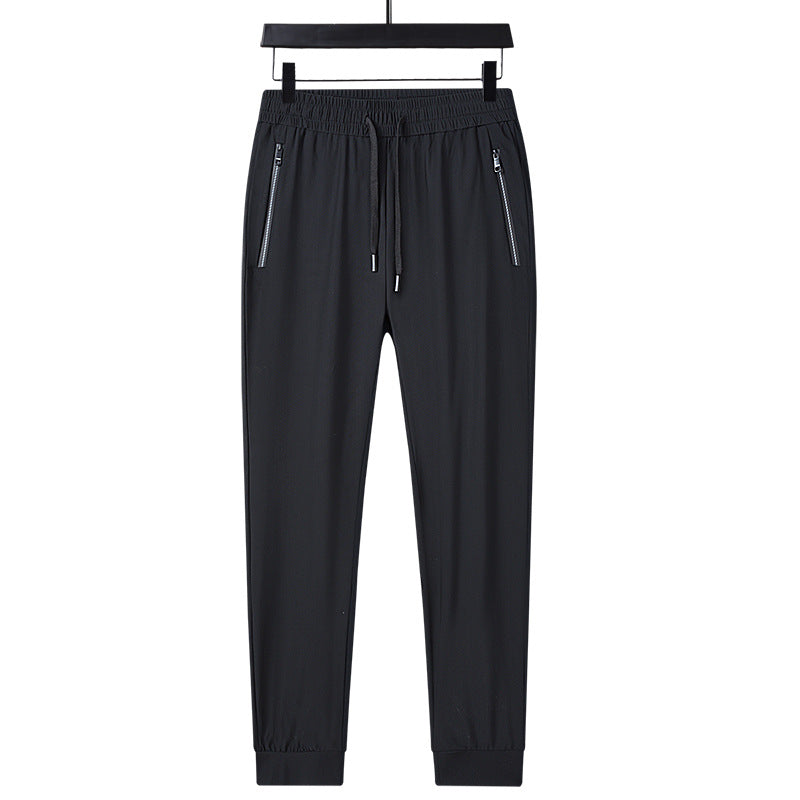 Men's sporty training pants with functional zippered pockets Mune Fashion